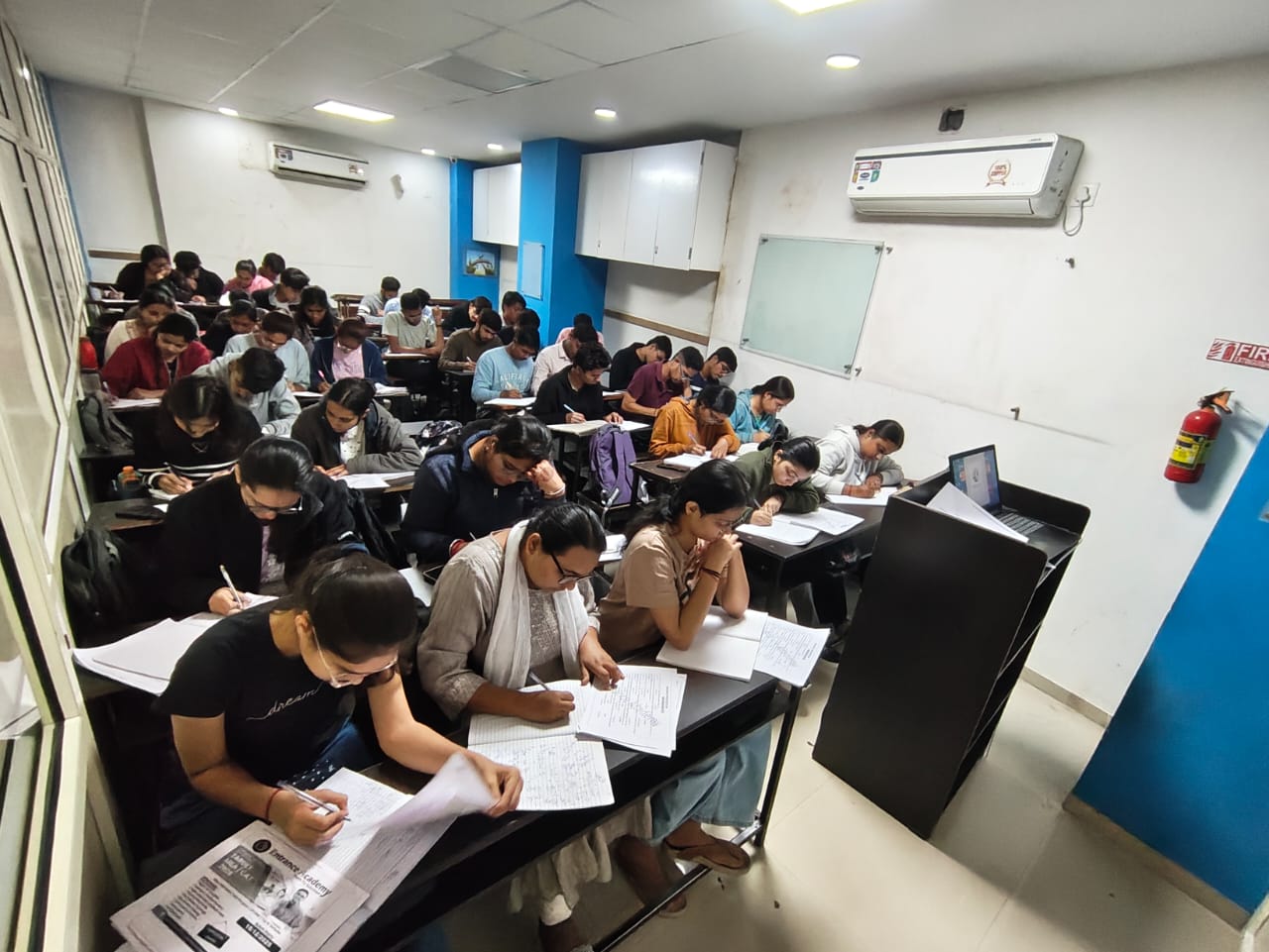 Entrance Academy Classroom - Students with materials